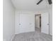An empty bedroom with neutral carpeting and closet space at 5622 Imperial Woods Cir, Indianapolis, IN 46224