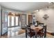 Charming dining room with hardwood floors and an inviting atmosphere for meals at 5697 Broadway St, Indianapolis, IN 46220