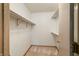 Walk-in closet featuring carpet and shelving for clothing storage at 5839 Quail Run Dr, Indianapolis, IN 46237