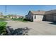 A well-maintained home with a paved driveway and manicured lawn at 5839 Quail Run Dr, Indianapolis, IN 46237