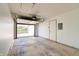 Spacious garage with automatic door opener and view to driveway at 5839 Quail Run Dr, Indianapolis, IN 46237