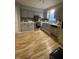 Well-equipped kitchen features stainless steel appliances, ample counter space, and modern finishes at 6011 Mcclellan Ct, Indianapolis, IN 46254