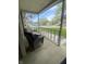 Relaxing covered front porch with comfortable seating offers a great view of the neighborhood at 6011 Mcclellan Ct, Indianapolis, IN 46254