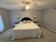 Serene bedroom with carpet, ensuite bathroom, and bedside lamps at 616 Elbow Bend Blvd, Greenwood, IN 46142