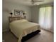 Cozy bedroom with neutral carpet and a bed with matching decor and lots of light at 616 Elbow Bend Blvd, Greenwood, IN 46142