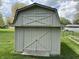 Exterior shed or outbuilding in a backyard, offering additional storage or workspace at 616 Elbow Bend Blvd, Greenwood, IN 46142