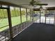 Inviting screened-in porch overlooking the landscaped backyard at 616 Elbow Bend Blvd, Greenwood, IN 46142