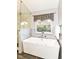 Bright bathroom showcasing a soaking tub and a window with natural light at 6164 Parrington Dr, Indianapolis, IN 46236