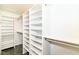 Large walk-in closet with custom shelving providing ample storage space at 6164 Parrington Dr, Indianapolis, IN 46236