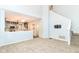Open-concept living area with views of the kitchen, staircase, and dining space at 6164 Parrington Dr, Indianapolis, IN 46236