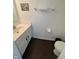 Practical powder room with a compact vanity and toilet at 621 Jack Pine Ct, Indianapolis, IN 46224
