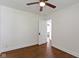 Cozy bedroom with hardwood floors, neutral walls, and ample natural light at 6307 Broadway St, Indianapolis, IN 46220
