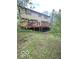 View of back of house from the yard, including deck at 650 Balroyal Ct, Indianapolis, IN 46234