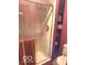 Shower featuring gold trim, neutral tile surround, and bronze shower head and handle at 650 Balroyal Ct, Indianapolis, IN 46234