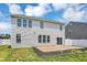 The backyard features a small patio, a green lawn, and a white picket fence at 6827 Fallen Leaf Dr, Whitestown, IN 46075