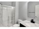 Bathroom featuring a glass shower and vanity with a modern black faucet at 6827 Fallen Leaf Dr, Whitestown, IN 46075