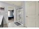 Bathroom with glass shower and view into the stylishly decorated main bedroom at 6827 Fallen Leaf Dr, Whitestown, IN 46075