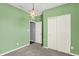 Bedroom with light green walls and large closet at 6827 Fallen Leaf Dr, Whitestown, IN 46075