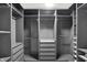 Custom walk-in closet with drawers, shelves, and hanging storage at 6827 Fallen Leaf Dr, Whitestown, IN 46075