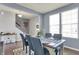 Elegant dining room with stylish chairs, a wooden table, and ample natural light at 6827 Fallen Leaf Dr, Whitestown, IN 46075