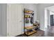 Functional entryway with storage for coats, shoes, and accessories at 6827 Fallen Leaf Dr, Whitestown, IN 46075