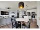 Open floor plan with a view of the kitchen, living room, and dining area at 6827 Fallen Leaf Dr, Whitestown, IN 46075