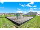 Community playground with climbing structures and play equipment in a safe environment at 6827 Fallen Leaf Dr, Whitestown, IN 46075