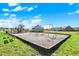 Community playground featuring swings, slides and lush green space at 6827 Fallen Leaf Dr, Whitestown, IN 46075