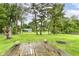 This home has a large backyard with a wooden deck at 7140 Avalon Trail Dr, Indianapolis, IN 46250