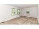 Inviting carpeted bedroom with natural light streaming through the windows, creating a serene atmosphere at 7140 Avalon Trail Dr, Indianapolis, IN 46250
