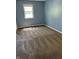 Carpeted bedroom with neutral walls and a window offering plenty of natural light at 7140 Avalon Trail Dr, Indianapolis, IN 46250