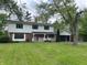 Charming two-story home with a well-manicured lawn and attached two car garage at 7140 Avalon Trail Dr, Indianapolis, IN 46250