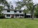 Charming two-story home with brick facade, well-manicured lawn, and attached two-car garage at 7140 Avalon Trail Dr, Indianapolis, IN 46250