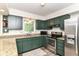 A bright kitchen features stainless steel appliances and stylish countertops and cabinets at 7140 Avalon Trail Dr, Indianapolis, IN 46250