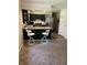 Stylish kitchen with stainless steel appliances, granite countertops, and a breakfast bar area at 7140 Avalon Trail Dr, Indianapolis, IN 46250