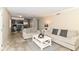 Spacious living room offering a view into the updated kitchen, perfect for entertaining at 7140 Avalon Trail Dr, Indianapolis, IN 46250