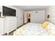 Comfortable main bedroom featuring a view into the attached primary bath at 7140 Avalon Trail Dr, Indianapolis, IN 46250