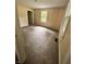 Bright bedroom with carpeted floors and neutral walls, featuring a window that offers natural light at 728 W 300 N, Anderson, IN 46011