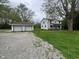 Charming two-story home with a two-car detached garage and ample green space at 728 W 300 N, Anderson, IN 46011
