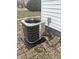 Exterior A/C unit, and a side of the house with white siding at 728 W 300 N, Anderson, IN 46011