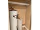 Utility room featuring a Richmond 6-year water heater and water softener at 728 W 300 N, Anderson, IN 46011