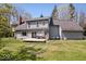 Large backyard showcasing an expansive lawn, deck area, and well-maintained exterior at 7425 E 300 S, Whitestown, IN 46075