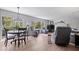 Bright living room with hardwood floors, a fireplace, and a view of the outdoors at 7425 E 300 S, Whitestown, IN 46075