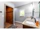 This bathroom features a tile shower, window, and a granite vanity at 8188 Spring Valley Dr, Plainfield, IN 46168