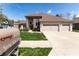 Charming brick home with three car garage, lawn, and mailbox on Spring Valley Drive at 8188 Spring Valley Dr, Plainfield, IN 46168