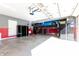 This large garage has painted walls, a car lift and ample storage at 8188 Spring Valley Dr, Plainfield, IN 46168