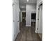 Hallway featuring clean sightlines, storage closet and access to multiple rooms at 8188 Spring Valley Dr, Plainfield, IN 46168