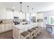Gourmet kitchen with an island, stainless steel appliances, and plenty of counter space for cooking at 8188 Spring Valley Dr, Plainfield, IN 46168