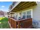 Charming back deck with wood railings overlooking a well-maintained lawn at 9014 Ramapo Dr, Fishers, IN 46038