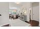 Dining room with elegant table setting, stylish furnishings, and open to other rooms at 9014 Ramapo Dr, Fishers, IN 46038